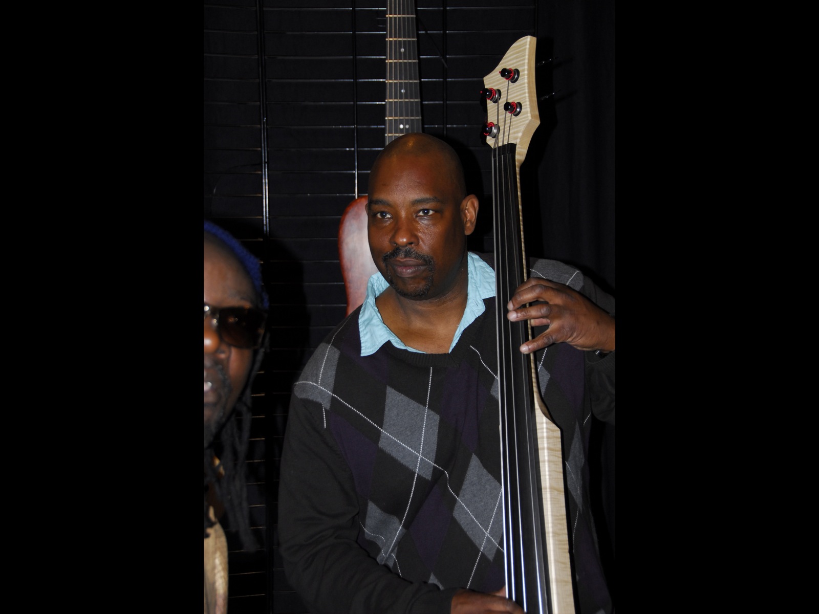 Raul Walton with a Fichter Electric Upright Bass